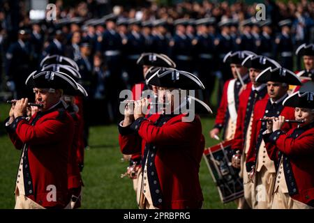 Washington, DC, USA. 26th Apr, 2023. The Old Guard Fife and Drum Corps performs at an arrival ceremony during a state visit with on the South Lawn of the White House in Washington, DC, US, on Wednesday, April 26, 2023. The US will strengthen the deterrence it provides South Korea against nuclear threats, securing a pledge from Seoul to honor commitments to not pursue its own atomic arsenal. Credit: Al Drago/Pool via CNP/dpa/Alamy Live News Stock Photo