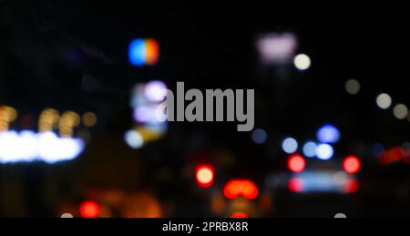 traffic in the city night Circular colorful bokeh light, abstract blur defocused background. Stock Photo