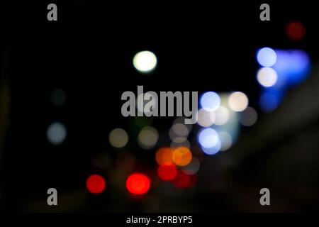 Blurred colorful bokeh light at night Stock Photo
