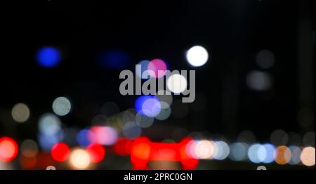 Blurred colorful bokeh light at night Stock Photo