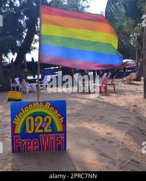 A rainbow flag welcomes LGBTQ+ visitors on Dongtan Beach, in Jomtien, Pattaya, Thailand. Stock Photo