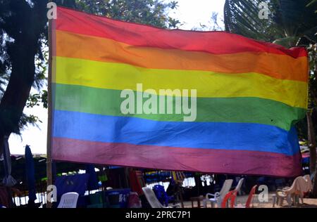 A rainbow flag welcomes LGBTQ+ visitors on Dongtan Beach, in Jomtien, Pattaya, Thailand. Stock Photo