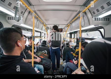 packed bus crowded standing room only Stock Photo