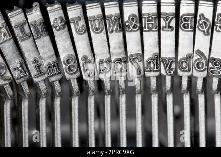 Close up of a Vintage Typewriter Slug Arms Stock Photo