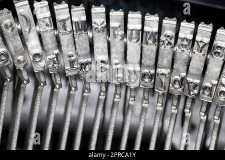 Close up of a Vintage Typewriter Slug Arms Stock Photo