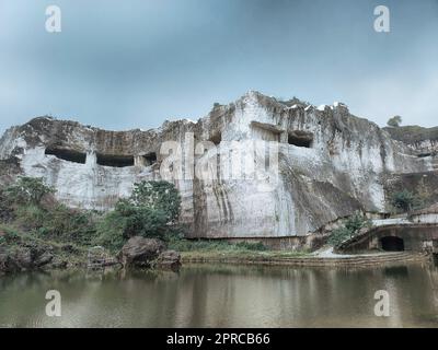 The former limestone quarry named as Bukit Jaddih or Jaddih Hills located in Bangkalan, Madura. East Java, Indonesia. Landscape and nature photography Stock Photo