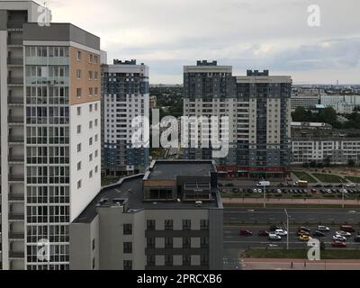 view of the modern city on a gloomy day with panel houses. Stock Photo