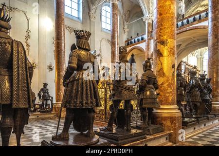 Bronze statues flank the the cenotaph of Maximilian I at the Hofkirche in Innsbruck Austria Stock Photo