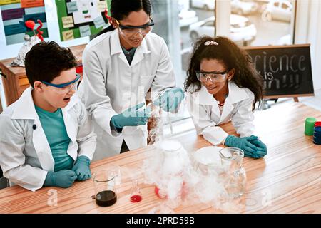 Science Experiments Encourage Exploration. An Adorable Little Boy And ...