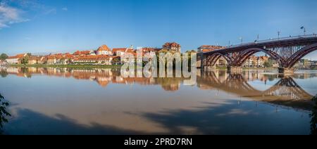 Lent district in Maribor, Slovenia. Popular waterfront promenade with historical buildings and the oldest grape vine in Europe. Stock Photo