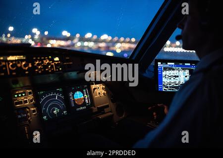 Commercial airliner airplane flight cockpit during takeoff Stock Photo