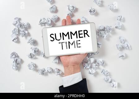 Writing displaying text Summer Time. Business overview Longer daylight Tropical season Beach activities Vacation Paper Wraps Underneath Phone Screen With Important Message. Stock Photo