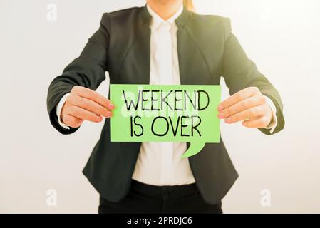 Inspiration showing sign Weekend Is Over. Internet Concept Time for relax has ended back to routine everyday activities Businessman in suit holding open palm symbolizing successful teamwork. Stock Photo