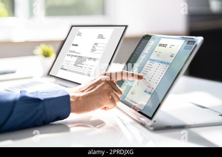 Invoice Accounting Software On Computer Stock Photo