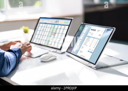 Invoice Accounting Software On Computer Stock Photo