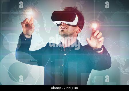 Have the business world at your fingertips. Studio shot of a handsome young businessman using a vr headset against a digitally imposed background. Stock Photo