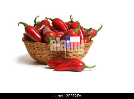 Red Jalapeno Peppers With Flag of Texas Isolated on White Background Stock Photo