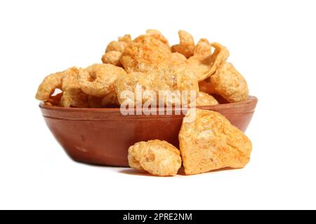 Bowl of Fried Pork Skins Isolated on White Background Stock Photo