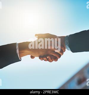 When two bosses become one. two businessmen shaking hands. Stock Photo