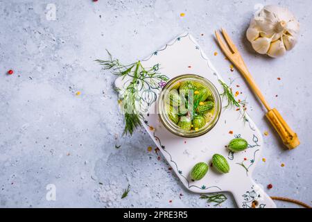 Homemade food: Pickled cucamelons (pickled cucumbers, pickled gherkins), grown in a organic kitchen Stock Photo