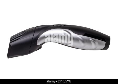 Close-up of a new black silver rechargeable beard and hair clipper isolated on a white background. Clipping path. Cordless hair and beard trimmer. Macro. Stock Photo