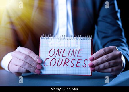 Sign displaying Online Courses, Internet Concept earning an education that is conducted over the Internet Stock Photo