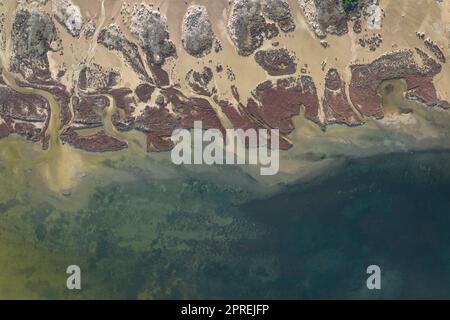 Aerial view of the beach on the Barra del Trabucador isthmus in the Ebro Delta (Montsià, Tarragona, Catalonia, Spain) ESP: Vista aérea de la playa Stock Photo