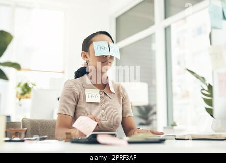 Tax, audit and finance business woman sleeping, taking nap and working at a desk in an office at work. Tired, corporate and accounting employee looking stressed and dealing with financial problem Stock Photo