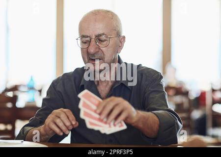 Senior man thinking about his next move in a game of chess Stock Photo by  dmytros9