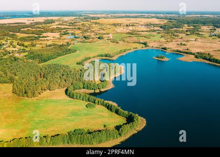 Braslaw District, Vitebsk Voblast, Belarus. Aerial View Of Nedrovo Lake, Green Forest Landscape. Top View Of Beautiful European Nature From High Attitude. Bird's Eye View. Famous Lakes Stock Photo