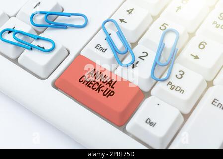 Sign displaying Annual Check Up. Business idea Yearly evaluation and examination of person s is health status Stock Photo