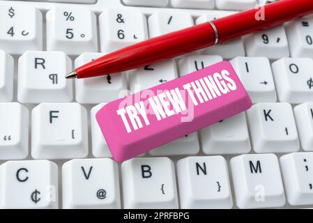 Writing displaying text Try New Things. Word Written on Do different activities get to know other ways of doing Businessman in suit holding notepad symbolizing successful teamwork. Stock Photo