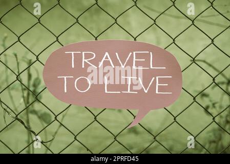 Hand writing sign Travel To Live. Business idea Get knowledge and exciting adventures by going on trips Businessman Holding Light Bulb With Digital Graph Presenting New Ideas. Stock Photo