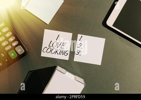 Hand writing sign I Love Cooking. Word Written on Having affection for culinary arts prepare foods and desserts Businessman in suit holding tablet symbolizing successful teamwork. Stock Photo