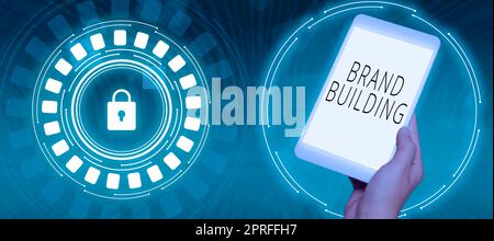 Text sign showing Brand Building, Internet Concept Develop a unique professional identity Personal product Man Holding Tablet With Late Data And Over Stock Photo