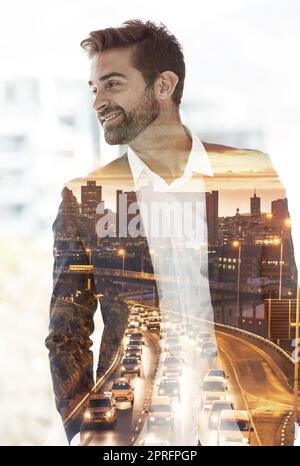 Well-suited to success. a handsome young businessman superimposed on a cityscape. Stock Photo