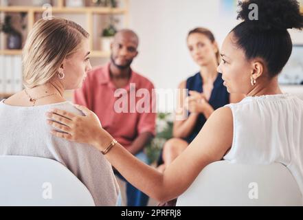 Psychology, mental health and support group with a woman in counseling for help with depression and anxiety with a psychologist she can trust. Communication, community or counselor with a sad patient Stock Photo