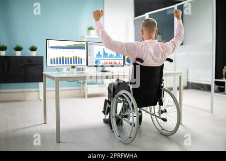 Excited Business Data Analyst Man Celebrating Stock Photo