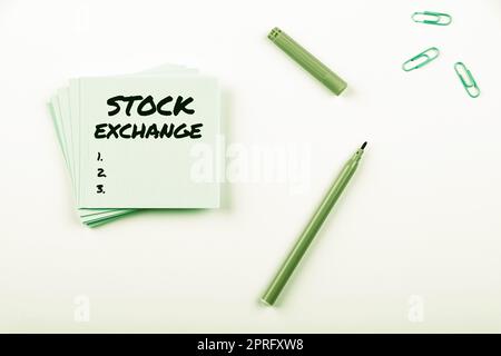 Sign displaying Stock ExchangeAn electronic market where owners of businesses get together. Business overview An electronic market where owners of businesses get together Businessman Pointing With Two Fingers On S And Presenting New Ideas. Stock Photo