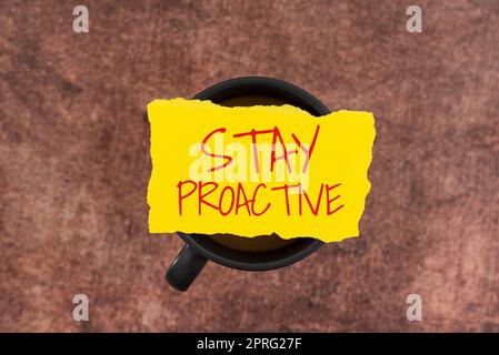 Text caption presenting Stay ProactiveTaking own decision to go ahead of anticipated events. Business overview Taking own decision to go ahead of anticipated events Important Messages Presented On Mobile Phone Leaning On Books And Notebook. Stock Photo