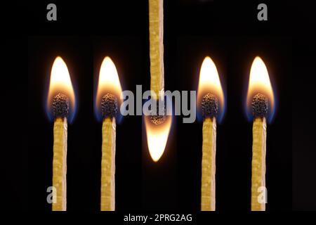 Fire and flame burning on matches sticks as light in the dark against black studio background. Closeup detail of a row of five bright art or artistic matchsticks with flames lit for heat Stock Photo