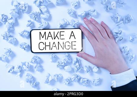 Text caption presenting Make A Change. Internet Concept Try new thing Evolve Evolution Improvement Growth Mature Lady in suit holding pen symbolizing successful teamwork accomplishments. Stock Photo