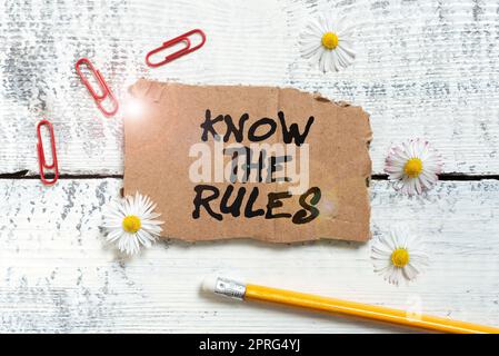 Hand writing sign Know The Rules. Business concept Learn the accepted principle or instructions to follow Man With Graphical Hexagon With Copy Space For Advertisement. Stock Photo