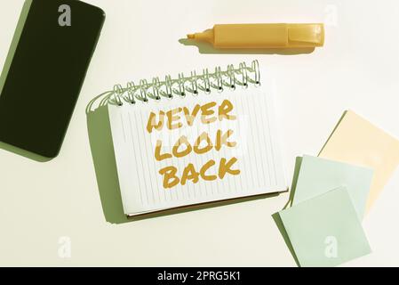 Sign displaying Never Look Back. Business showcase Do not have regrets for your actions be optimistic Boy Presenting Important Informations On Presentation Board. Stock Photo