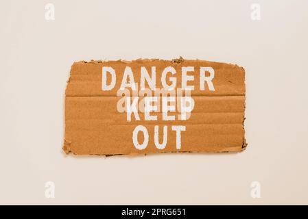 Sign displaying Danger Keep Out. Concept meaning Warning be alert stay away from this point safety sign Pinned Presentation Board With Important Messages Written In. Stock Photo