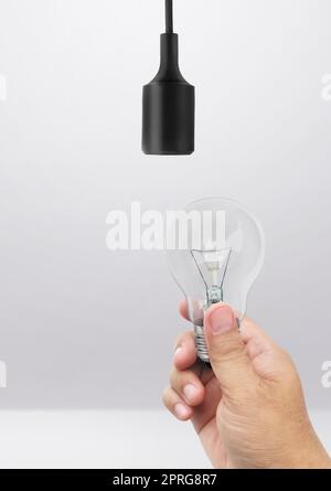 Power save LED lamp changing Stock Photo