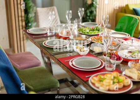 Beautifully catering table set service with variety of dishes to celebrate in restaurant. Stock Photo