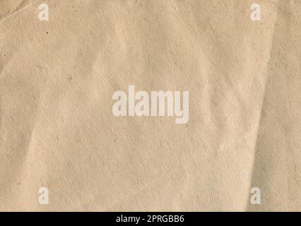 front view closeup of vintage brown craft paper texture pattern background with wrinkles and imperfections Stock Photo
