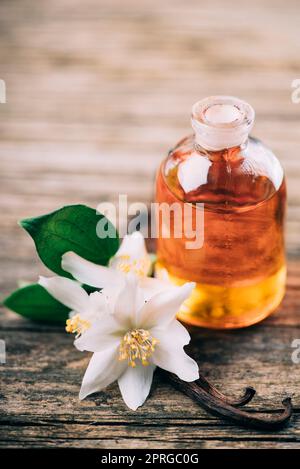 Essential oil with jasmine flower and vanilla Stock Photo