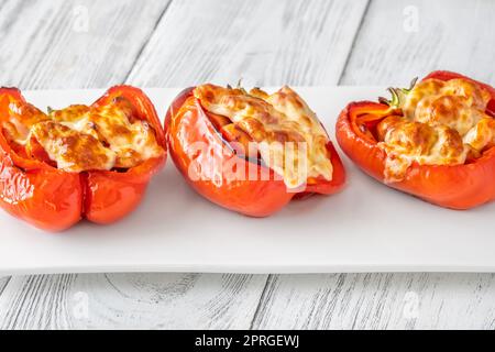 Baked bell peppers stuffed with sausage Stock Photo